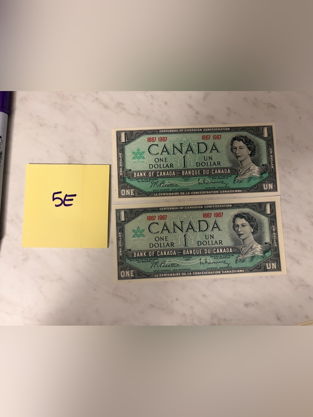 1967 set of 2 - Canada Centennial One Dollar Bills - Green - uncirculated